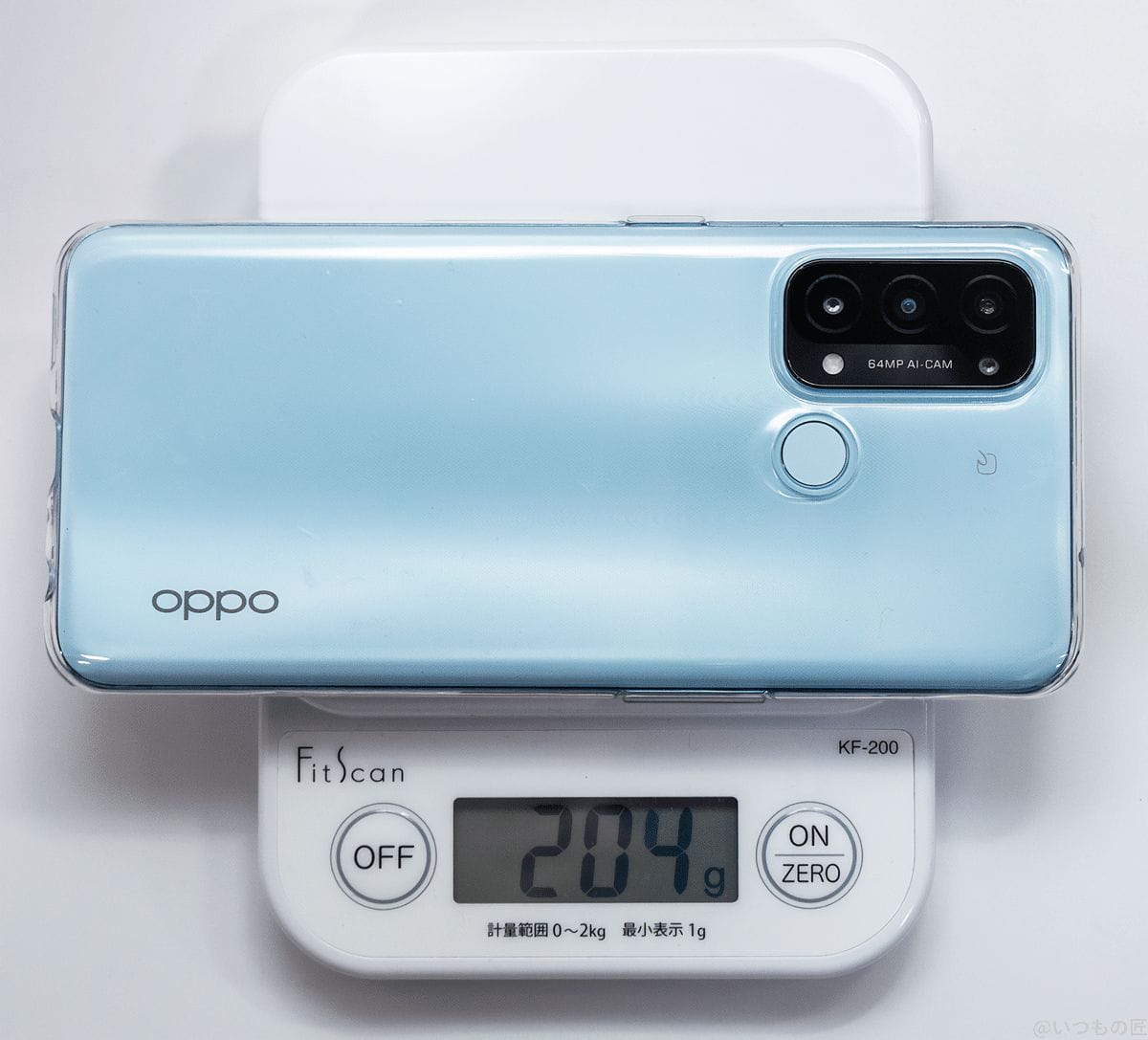 OPPO Reno5Aを標準添付のケースに入れて計量器で計測すると、204gです。